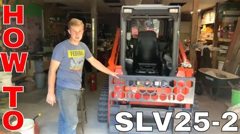 kubota skid steer hydraulic oil fill location|kubota svl75 oil filter change.